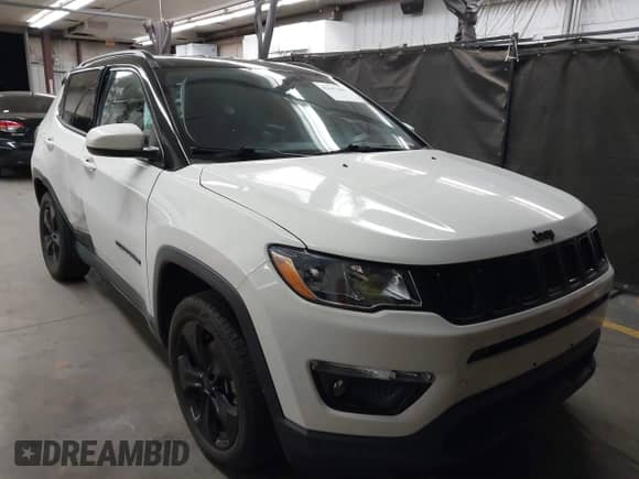 2019 Jeep Compass Latitude with VIN 3C4NJDBB7KT754348, listed as a IAAI auction lot 42617408 with 59,670 mi miles and . Bid and sale history available at DreamBid. Image 1.