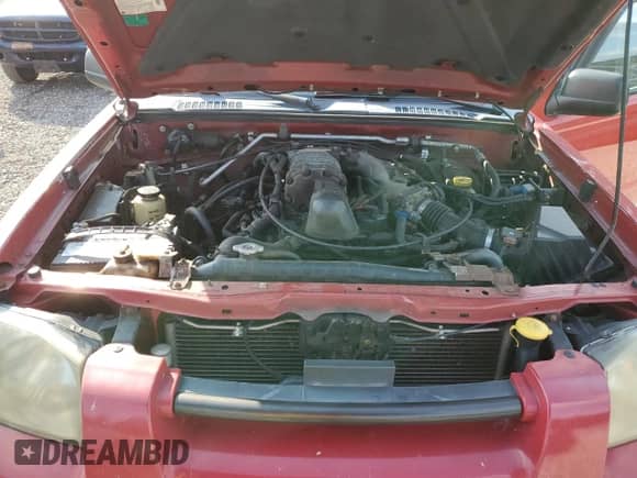 2003 Nissan Frontier SVE с VIN 1N6MD26Y43C414221, выставлен на аукционе Copart как лот 80705445 с пробегом 202 638 миль миль и Списание • Salvage title. История ставок и продаж доступна на DreamBid. Изображение 11.