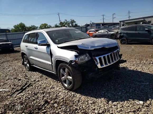 2011 Jeep Grand Cherokee Overland z VIN 1J4RR6GT3BC560039, wystawiony jako Copart lot #84042865 z przebiegiem 150 169 mil mil oraz Szkoda całkowita • Salvage title. Historia ofert i sprzedaży dostępna na DreamBid. Obrazek 14.