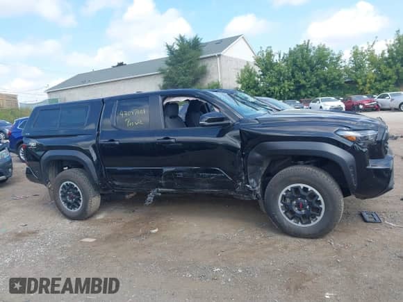 2024 Toyota Tacoma SR5 with VIN 3TMLB5JN4RM054958, listed as a IAAI auction lot 43047601 with 15,429 mi miles and . Bid and sale history available at DreamBid. Image 13.
