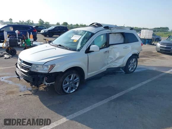 2013 Dodge Journey Crew with VIN 3C4PDDDG5DT567654, listed as a IAAI auction lot 42561948 with 158,434 mi miles and . Bid and sale history available at DreamBid. Image 19.