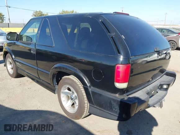 2004 Chevrolet Blazer LS with VIN 1GNCS18X34K124697, listed as a IAAI auction lot 43276720 with 192,964 mi miles and . Bid and sale history available at DreamBid. Image 3.
