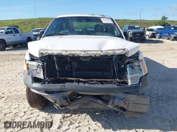 2014 Ford F-150 STX with VIN 1FTFX1CF5EKD93744, listed as a IAAI auction lot 43280853 with 144,024 mi miles and . Bid and sale history available at DreamBid. Image 6.