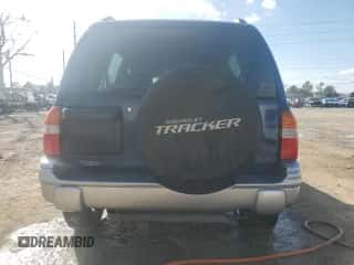 2002 Chevrolet Tracker LT with VIN 2CNBE634826950981, listed as a Copart auction lot 77488654 with 154,126 mi miles and Salvage title. Bid and sale history available at DreamBid. Image 6.