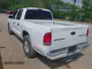 2003 Dodge Dakota Sport with VIN 1D7HL38X63S226121, listed as a IAAI auction lot 42136000 with 231,077 mi miles and . Bid and sale history available at DreamBid. Image 3.