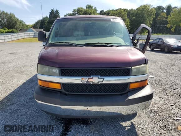 2004 Chevrolet Express Passenger with VIN 1GNFG15T041201242, listed as a Copart auction lot 68769354 with 186,014 mi miles and Salvage title. Bid and sale history available at DreamBid. Image 5.