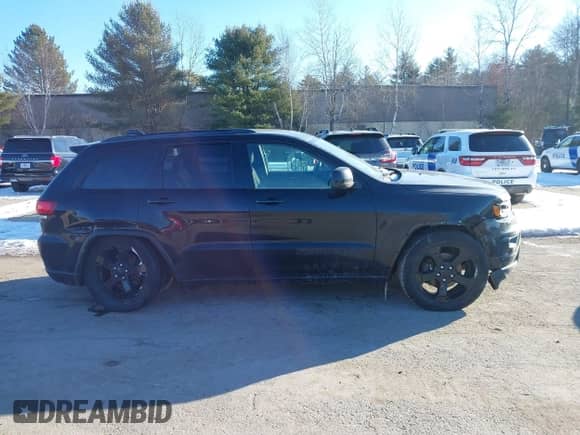 2018 Jeep Grand Cherokee Laredo E z VIN 1C4RJFAGXJC375588, wystawiony jako IAAI lot #41406344 z przebiegiem 69 989 mil mil oraz . Historia ofert i sprzedaży dostępna na DreamBid. Obrazek 13.