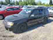 2004 Subaru Forester XT with VIN JF1SG69654H724553, listed as a Copart auction lot 63303605 with 238,806 mi miles and Salvage title. Bid and sale history available at DreamBid. Image 1.