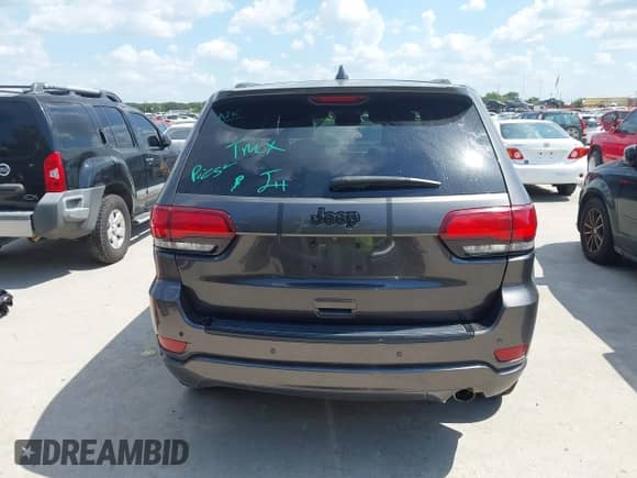 2018 Jeep Grand Cherokee Laredo E with VIN 1C4RJEAG6JC304365, listed as a IAAI auction lot 43023758 with 140,626 mi miles and . Bid and sale history available at DreamBid. Image 16.