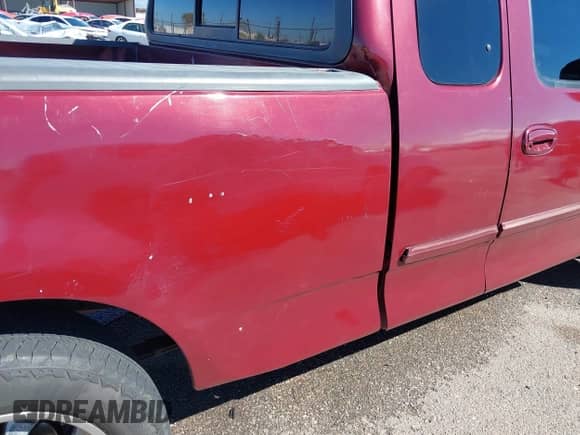 1999 Ford F-150 with VIN 1FTRX17W3XKB03527, listed as a IAAI auction lot 43450405 with 121,752 mi miles and . Bid and sale history available at DreamBid. Image 18.