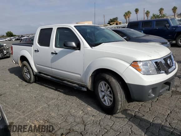 2017 Nissan Frontier Desert Runner with VIN 1N6DD0ER1HN746420, listed as a Copart auction lot 61872095 with 90,404 mi miles and Salvage title. Bid and sale history available at DreamBid. Image 4.