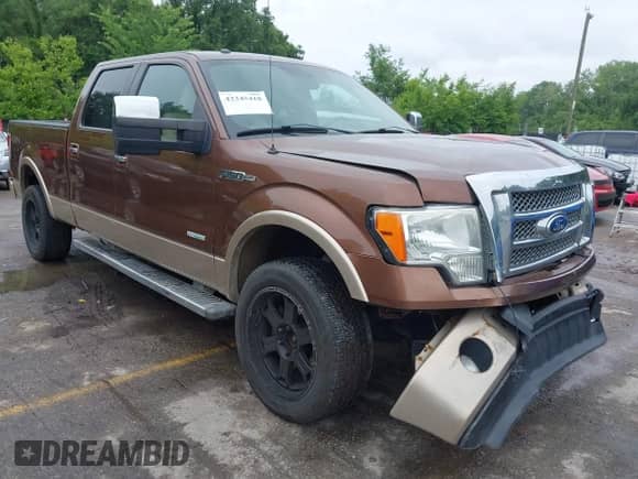2011 Ford F-150 XLT z VIN 1FTFW1ET3BFA97549, wystawiony jako IAAI lot #42345418 z przebiegiem 189 105 mil mil oraz . Historia ofert i sprzedaży dostępna na DreamBid. Obrazek 1.