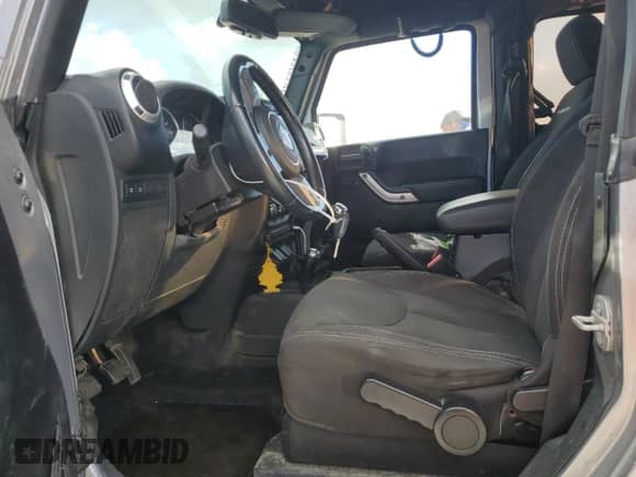 2015 Jeep Wrangler Rubicon z VIN 1C4BJWCG9FL542089, wystawiony jako Copart lot #76111634 z przebiegiem Nie podano mil oraz Nie do naprawy • Non repairable. Historia ofert i sprzedaży dostępna na DreamBid. Obrazek 7.