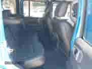 2022 Jeep Wrangler Unlimited Sahara with VIN 1C4HJXEN0NW207960, listed as a IAAI auction lot 42746690 with 79,779 mi miles and . Bid and sale history available at DreamBid. Image 8.