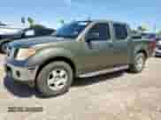 2005 Nissan Frontier SE with VIN 1N6AD07U15C402856, listed as a Copart auction lot 65883815 with 130,400 mi miles and Salvage title. Bid and sale history available at DreamBid. Image 1.