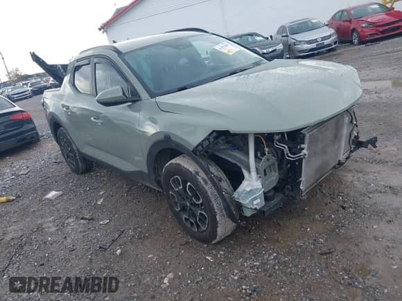 2023 Hyundai Santa Cruz SEL Premium z VIN 5NTJDDAF8PH057158, wystawiony jako IAAI lot #43297490 z przebiegiem 22 330 mil mil oraz . Historia ofert i sprzedaży dostępna na DreamBid. Obrazek 1.
