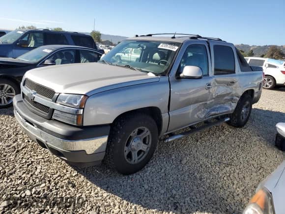 2005 Chevrolet Avalanche Z66 z VIN 3GNEC12Z05G121605, wystawiony jako Copart lot #82097055 z przebiegiem 158 787 mil mil oraz Szkoda całkowita • Salvage title. Historia ofert i sprzedaży dostępna na DreamBid. Obrazek 1.