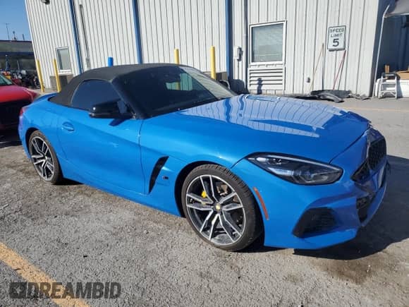 2020 BMW Z4 sDrive30i with VIN WBAHF3C01LWW76728, listed as a Copart auction lot 82159425 with 58,031 mi miles and Salvage title. Bid and sale history available at DreamBid. Image 4.