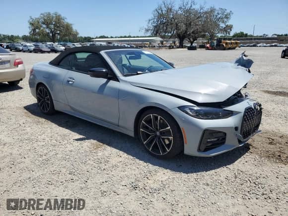 2022 BMW 4 Series 430i xDrive with VIN WBA43AT07NCJ20732, listed as a Copart auction lot 55248585 with 9,040 mi miles and Salvage title. Bid and sale history available at DreamBid. Image 4.
