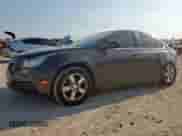 2014 Chevrolet Cruze 1LT z VIN 1G1PC5SB9E7291073, wystawiony jako Copart lot #72093165 z przebiegiem 172 665 mil mil oraz Szkoda całkowita • Salvage title. Historia ofert i sprzedaży dostępna na DreamBid. Obrazek 1.