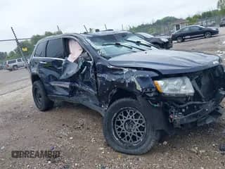 2012 Jeep Grand Cherokee Overland z VIN 1C4RJFCGXCC272719, wystawiony jako IAAI lot #43129211 z przebiegiem 160 203 mil mil oraz . Historia ofert i sprzedaży dostępna na DreamBid. Obrazek 1.