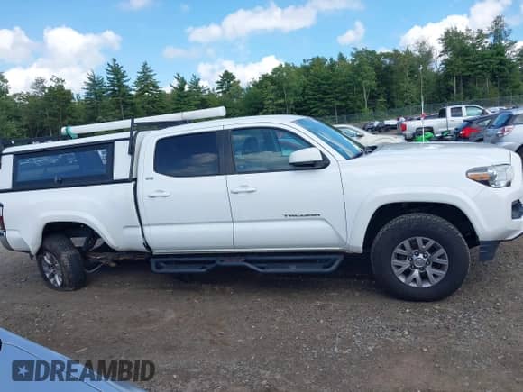2019 Toyota Tacoma SR5 with VIN 5TFDZ5BN5KX044728, listed as a IAAI auction lot 43150392 with 147,827 mi miles and . Bid and sale history available at DreamBid. Image 14.