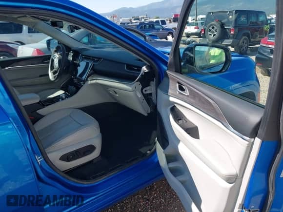 2023 Jeep Grand Cherokee Overland with VIN 1C4RJHDG4P8741175, listed as a IAAI auction lot 42509695 with 50,989 mi miles and . Bid and sale history available at DreamBid. Image 5.