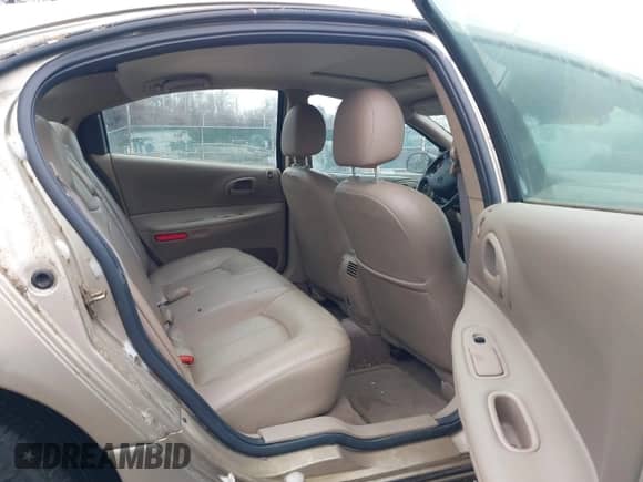 2003 Dodge Intrepid ES z VIN 2B3HD56M63H554529, wystawiony jako IAAI lot #41584694 z przebiegiem 99 681 mil mil oraz . Historia ofert i sprzedaży dostępna na DreamBid. Obrazek 8.