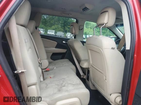 2018 Dodge Journey SXT z VIN 3C4PDDBG9JT251284, wystawiony jako Copart lot #69076405 z przebiegiem 141 084 mil mil oraz Czysty tytuł • Clean title. Historia ofert i sprzedaży dostępna na DreamBid. Obrazek 11.