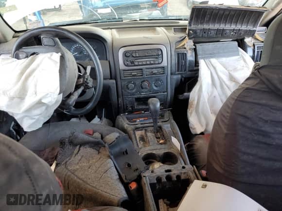 2003 Jeep Grand Cherokee Laredo z VIN 1J4GX48S53C518626, wystawiony jako Copart lot #71123695 z przebiegiem 196 154 mil mil oraz Szkoda całkowita • Salvage title. Historia ofert i sprzedaży dostępna na DreamBid. Obrazek 8.