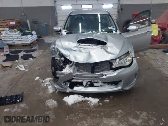 2012 Subaru WRX WRX with VIN JF1GV7E65CG023040, listed as a IAAI auction lot 41622053 with 110,718 mi miles and . Bid and sale history available at DreamBid. Image 6.