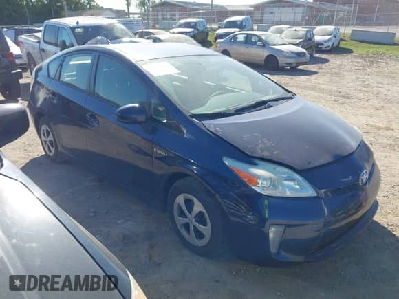 2015 Toyota Prius Two z VIN JTDKN3DU6F1992270, wystawiony jako IAAI lot #43478917 z przebiegiem 303 194 mil mil oraz . Historia ofert i sprzedaży dostępna na DreamBid. Obrazek 1.