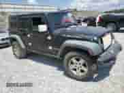 2008 Jeep Wrangler Unlimited Rubicon z VIN 1J4GA69188L554885, wystawiony jako Copart lot #66493815 z przebiegiem 251 746 mil mil oraz Szkoda całkowita • Salvage title. Historia ofert i sprzedaży dostępna na DreamBid. Obrazek 4.