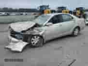 2002 Toyota Camry LE с VIN 4T1BE32K52U555219, выставлен на аукционе Copart как лот 84436005 с пробегом Не указан миль и Списание • Salvage title. История ставок и продаж доступна на DreamBid. Изображение 1.