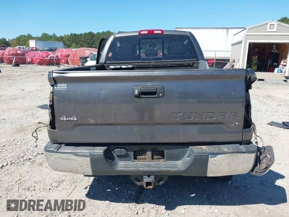 2015 Toyota Tundra SR z VIN 5TFUW5F17FX479045, wystawiony jako IAAI lot #43363287 z przebiegiem 212 178 mil mil oraz . Historia ofert i sprzedaży dostępna na DreamBid. Obrazek 16.