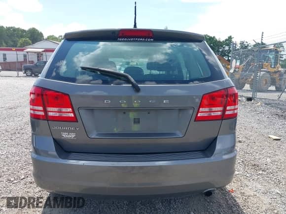 2013 Dodge Journey American Value z VIN 3C4PDCAB2DT560776, wystawiony jako IAAI lot #42988970 z przebiegiem 126 698 mil mil oraz . Historia ofert i sprzedaży dostępna na DreamBid. Obrazek 17.