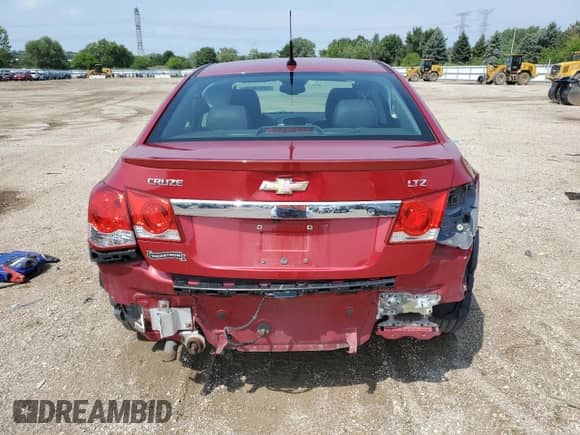 2014 Chevrolet Cruze LTZ z VIN 1G1PG5SB3E7270711, wystawiony jako Copart lot #68978635 z przebiegiem 77 663 mil mil oraz Szkoda całkowita • Salvage title. Historia ofert i sprzedaży dostępna na DreamBid. Obrazek 6.
