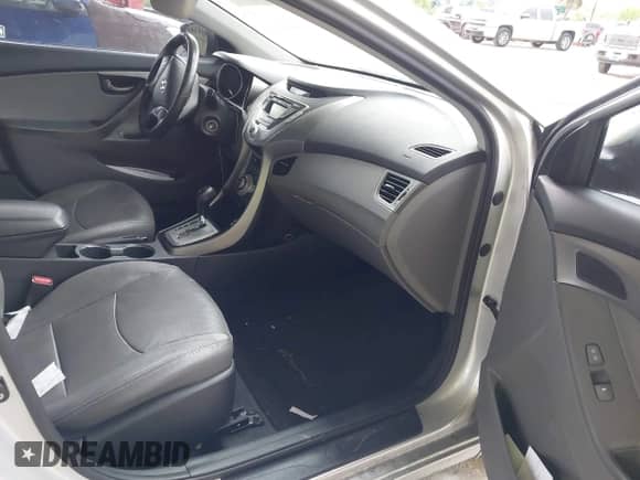 2012 Hyundai Elantra Limited z VIN KMHDH4AEXCU417274, wystawiony jako IAAI lot #43179736 z przebiegiem 146 671 mil mil oraz . Historia ofert i sprzedaży dostępna na DreamBid. Obrazek 5.