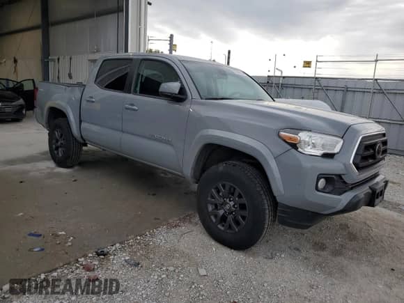 2021 Toyota Tacoma TRD Off Road with VIN 3TMCZ5AN5MM429356, listed as a Copart auction lot 71444135 with 68,728 mi miles and Salvage title. Bid and sale history available at DreamBid. Image 4.