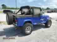1990 Jeep Wrangler z VIN 2J4FY39T8LJ519849, wystawiony jako Copart lot #50917265 z przebiegiem 153 966 mil mil oraz Czysty tytuł • Clean title. Historia ofert i sprzedaży dostępna na DreamBid. Obrazek 3.