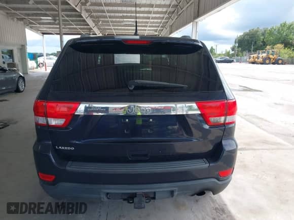 2011 Jeep Grand Cherokee Laredo with VIN 1J4RS4GG7BC515567, listed as a IAAI auction lot 43176668 with 147,454 mi miles and . Bid and sale history available at DreamBid. Image 17.