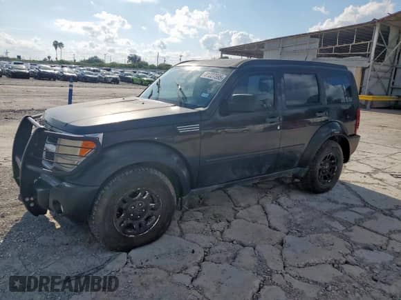 2011 Dodge Nitro SE with VIN 1D4PT2GK9BW509984, listed as a Copart auction lot 81227595 with 94,262 mi miles and Salvage title. Bid and sale history available at DreamBid. Image 1.