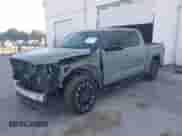 2025 Toyota Tundra Limited with VIN 5TFJA5DB3SX323804, listed as a IAAI auction lot 43213270 with 202 mi miles and . Bid and sale history available at DreamBid. Image 2.