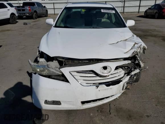 2007 Toyota Camry XLE z VIN 4T1BE46K67U630923, wystawiony jako Copart lot #82008635 z przebiegiem 89 494 mil mil oraz Szkoda całkowita • Salvage title. Historia ofert i sprzedaży dostępna na DreamBid. Obrazek 5.