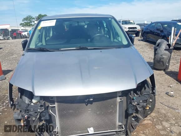 2016 Dodge Grand Caravan SE Plus z VIN 2C4RDGBG2GR400950, wystawiony jako IAAI lot #42622066 z przebiegiem 132 801 mil mil oraz . Historia ofert i sprzedaży dostępna na DreamBid. Obrazek 13.