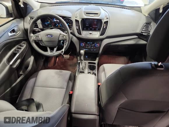 2017 Ford Escape SE с VIN 1FMCU9GD7HUC21075, выставлен на аукционе Copart как лот 82115645 с пробегом 91 949 миль миль и На запчасти • Non repairable. История ставок и продаж доступна на DreamBid. Изображение 8.