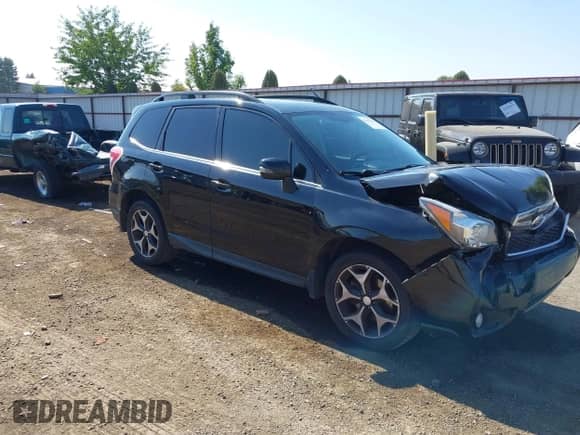 2014 Subaru Forester XT Touring z VIN JF2SJGMCXEH530537, wystawiony jako IAAI lot #43267826 z przebiegiem 102 917 mil mil oraz . Historia ofert i sprzedaży dostępna na DreamBid. Obrazek 1.