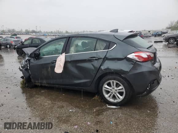 2018 Chevrolet Cruze LT with VIN 3G1BE6SM1JS654408, listed as a Copart auction lot 51922865 with 146,081 mi miles and Salvage title. Bid and sale history available at DreamBid. Image 2.