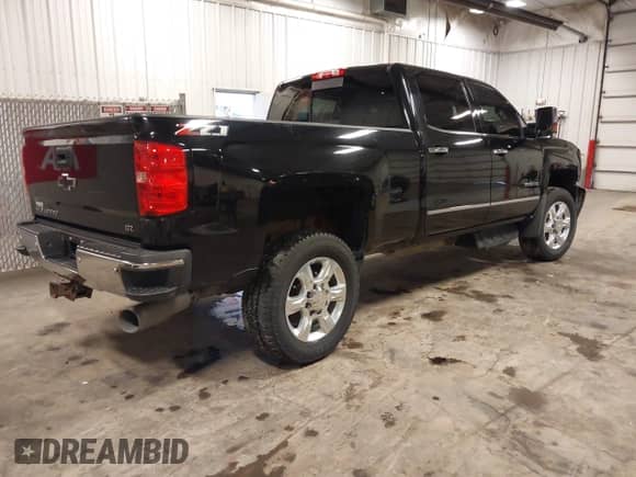 2018 Chevrolet Silverado 2500HD LTZ with VIN 1GC1KWEY0JF113462, listed as a IAAI auction lot 42581114 with 115,545 mi miles and . Bid and sale history available at DreamBid. Image 4.