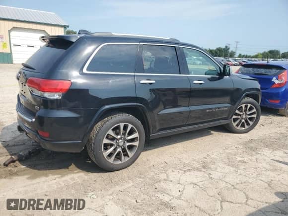 2018 Jeep Grand Cherokee Overland with VIN 1C4RJFCT6JC111925, listed as a Copart auction lot 59027654 with 96,147 mi miles and Salvage title. Bid and sale history available at DreamBid. Image 3.
